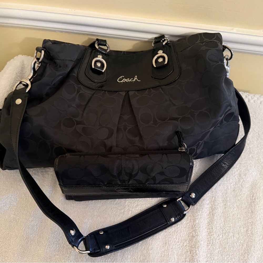 Coach Black Shoulder Bag with Adjustable Strap and Silver Hardware